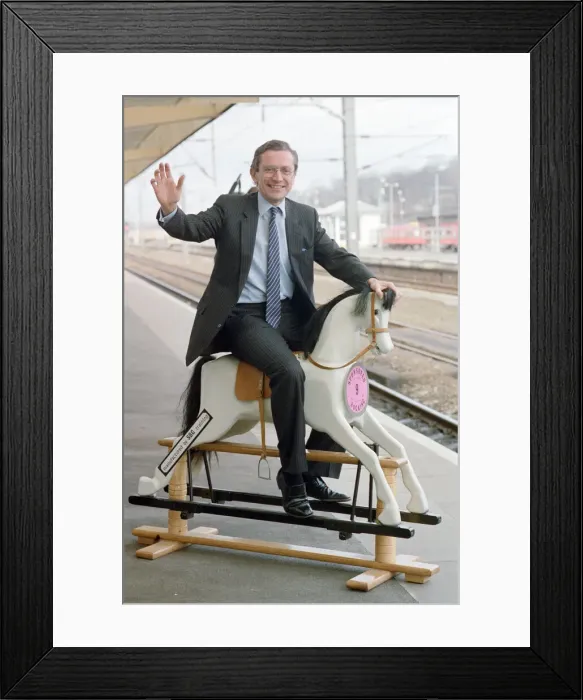 Framed Print : Employment Secretary, Norman Fowler, on a rocking horse Framed Print : Employment Secretary, Norman Fowler, on a rocking horse