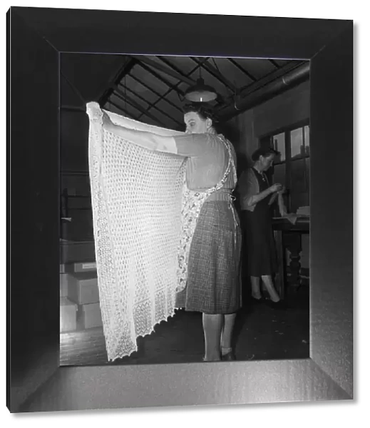 A lace shawl seen here undergoing quality control at The Shawl Factory of GH Hurt