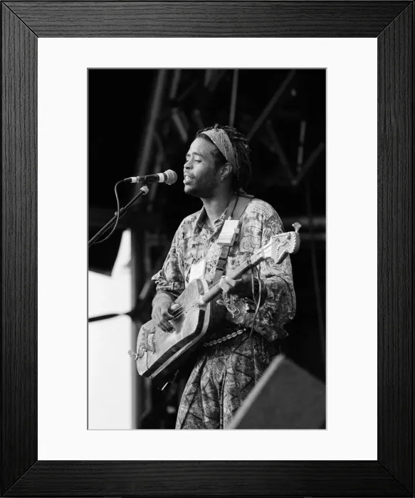 Framed Print : Hassan Hakmoun performing at WOMAD festival at Rivermead in Reading, Berkshire Framed Print : Hassan Hakmoun performing at WOMAD festival at Rivermead in Reading, Berkshire