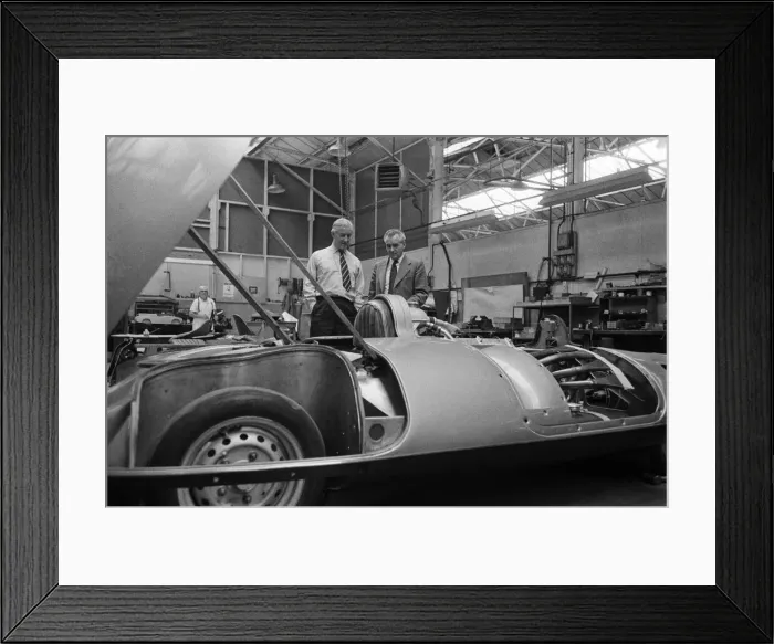 Framed Print : Men, including Syd Enever and Tommy Wisdom looking at the MG EX181 which is being worked Framed Print : Men, including Syd Enever and Tommy Wisdom looking at the MG EX181 which is being worked