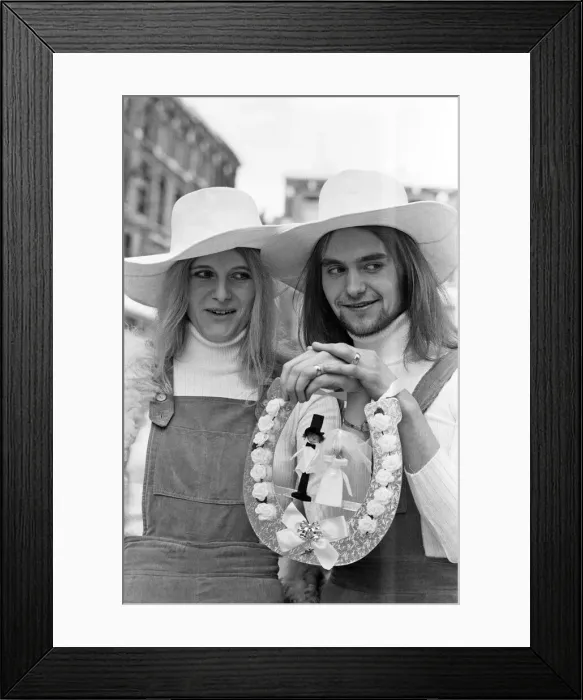 Framed Print : Unisex Wedding. Here come the bride and groom, dressed identically Framed Print : Unisex Wedding. Here come the bride and groom, dressed identically