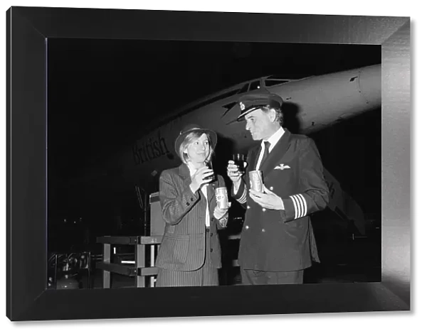 British Airways Concorde stewardess Carol Bryant and Concorde captain John Cookdrink