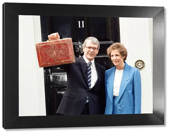 Chancellor of the Exchequer John Major at 11 Downing Street with his wife Norma as he