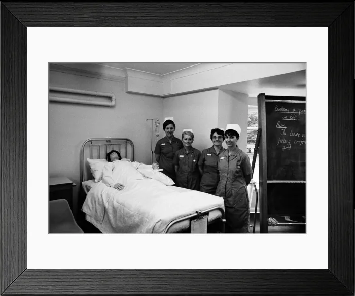 Framed Print : Nurses training with their dummy patient. This is for the future hospital which will be Framed Print : Nurses training with their dummy patient. This is for the future hospital which will be