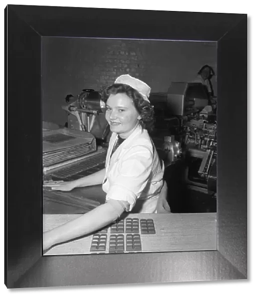 Worker on the production line at the Cadbury factory at Bourneville 26th March 1953