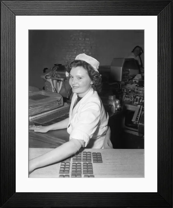 Framed Print : Worker on the production line at the Cadbury factory at Bourneville 26th March 1953