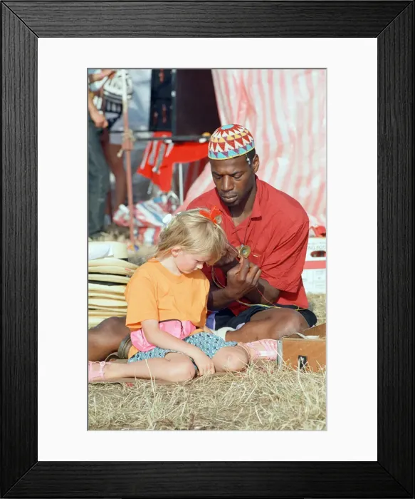 Framed Print : WOMAD festival at Rivermead in Reading, Berkshire, 18th July 1992 Framed Print : WOMAD festival at Rivermead in Reading, Berkshire, 18th July 1992