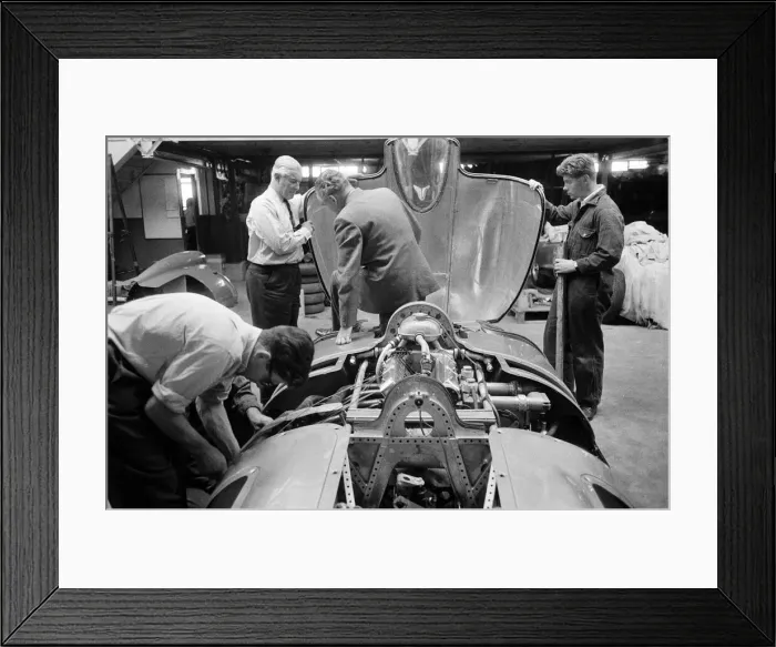Framed Print : Men, including Syd Enever and Tommy Wisdom looking at the MG EX181 which is being worked Framed Print : Men, including Syd Enever and Tommy Wisdom looking at the MG EX181 which is being worked
