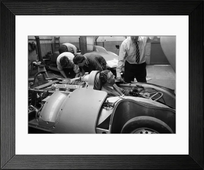 Framed Print : Men, including Syd Enever and Tommy Wisdom looking at the MG EX181 which is being worked Framed Print : Men, including Syd Enever and Tommy Wisdom looking at the MG EX181 which is being worked