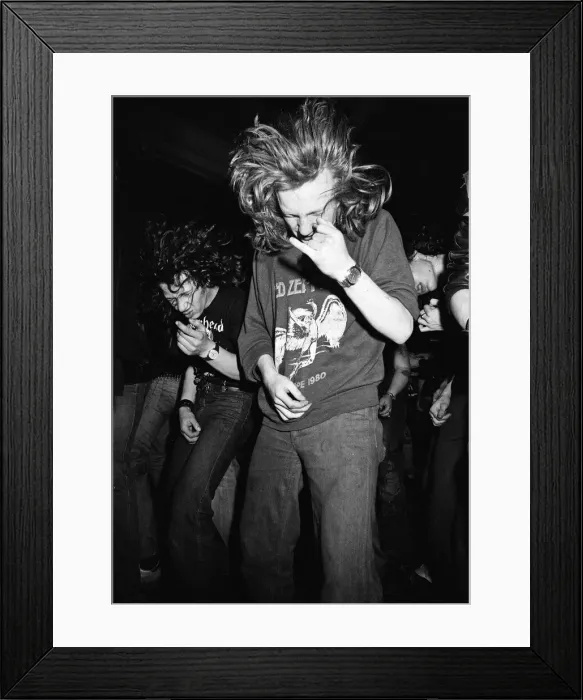 Framed Print : Heavy Metal music fans enjoying a night out. 1981 Framed Print : Heavy Metal music fans enjoying a night out. 1981