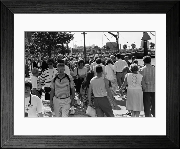 Framed Print : Crowds of people line the dock road set for a day out at Liverpool Albert Dock to see