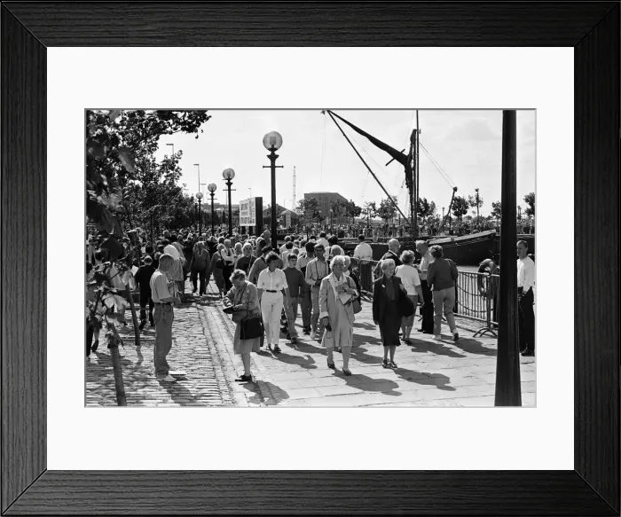 Framed Print : Crowds of people line the dock road set for a day out at Liverpool Albert Dock to see