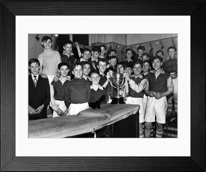 Framed Print : All smiles in the dressing room after a hard-fought game Framed Print : All smiles in the dressing room after a hard-fought game