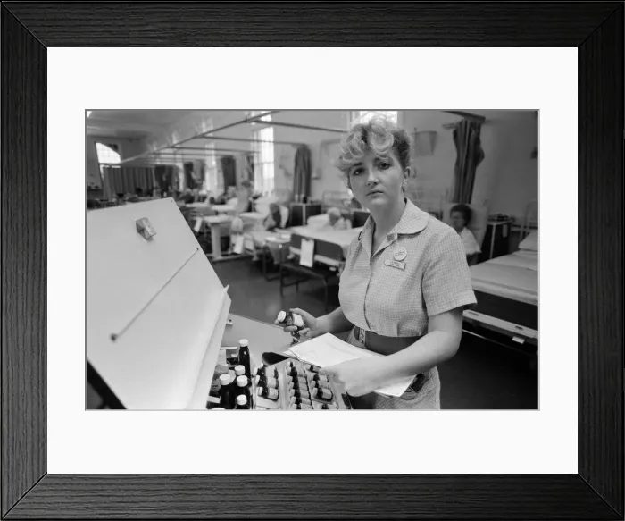 Framed Print : Nurse Deirdre McHugh, at Whipps Cross Hospital, who is going off to the States to work
