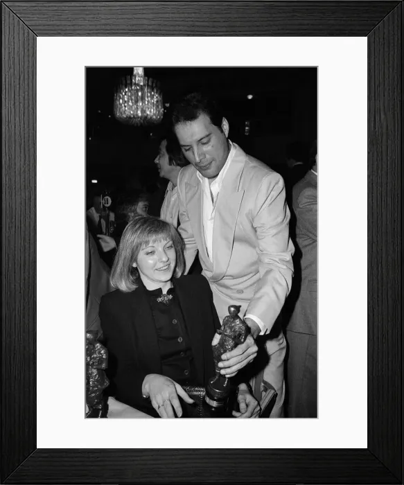 Framed Print : The Ivor Novello Awards. Pictured, Freddie Mercury of Queen and Mary Austin