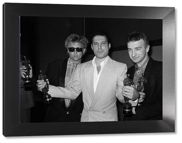 The Ivor Novello Awards. Pictured, Roger Taylor, Freddie Mercury and John Deacon of Queen