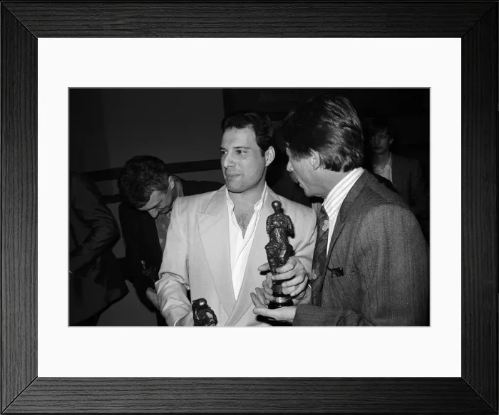 Framed Print : The Ivor Novello Awards. Pictured, John Deacon and Freddie Mercury of Queen with their
