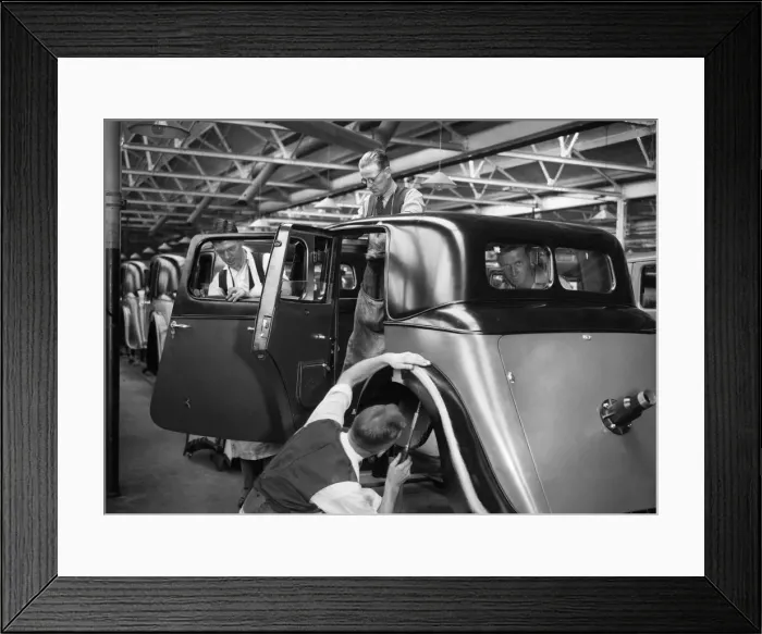 Framed Print : Workers on the Gloria assembly line in the Triumph car factory in Coventry Framed Print : Workers on the Gloria assembly line in the Triumph car factory in Coventry