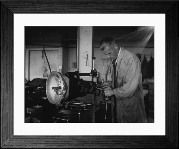 Framed Print : Worker assembling a gearbox in the Triumph car factory in Coventry. 23rd September 1931