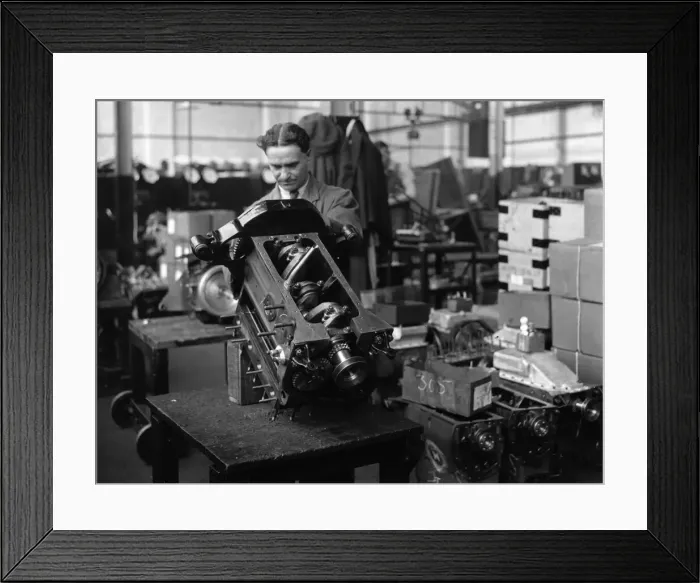 Framed Print : Engines being assembled at the Triumph car factory in Coventry. 23 September 1931 Framed Print : Engines being assembled at the Triumph car factory in Coventry. 23 September 1931