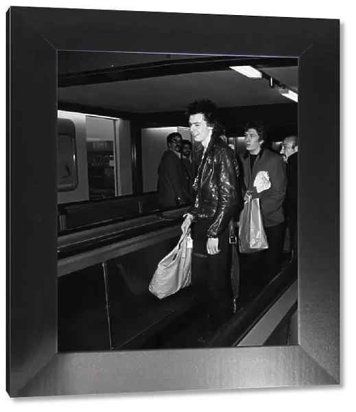 The Sex Pistols at Heathrow Airport before flying off for an American tour