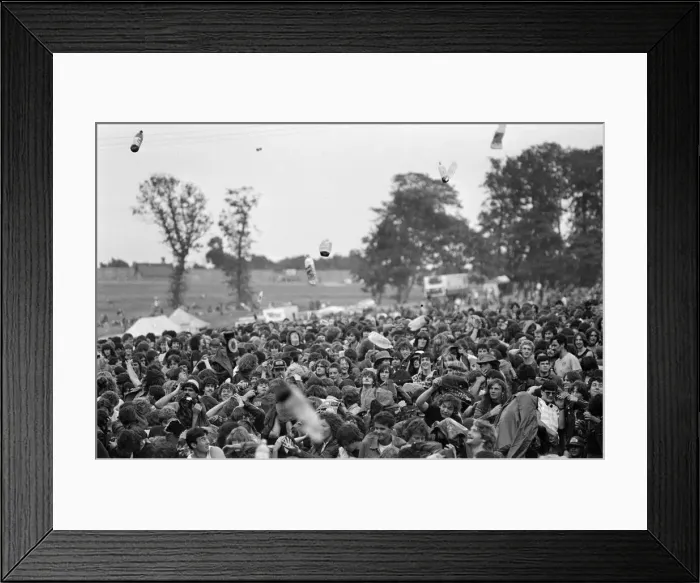 Framed Print : Bottles being thrown in the audience at Monsters of Rock festival at Castle Donington Framed Print : Bottles being thrown in the audience at Monsters of Rock festival at Castle Donington