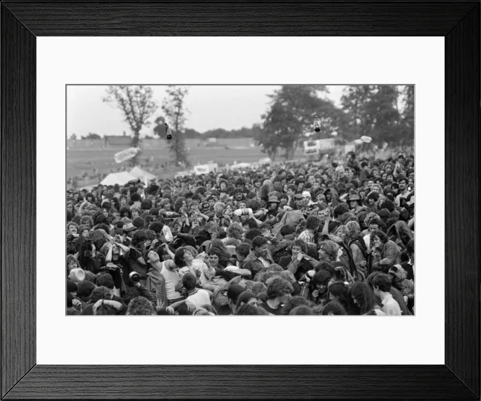 Framed Print : Bottles being thrown in the audience at Monsters of Rock festival at Castle Donington Framed Print : Bottles being thrown in the audience at Monsters of Rock festival at Castle Donington