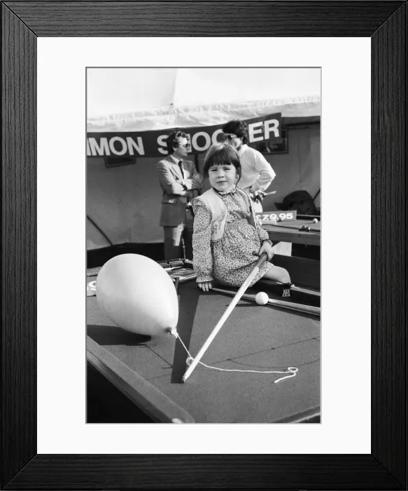 Framed Print : Reading show in Reading, Berkshire. (Picture) Young girl on pool table posing for Framed Print : Reading show in Reading, Berkshire. (Picture) Young girl on pool table posing for