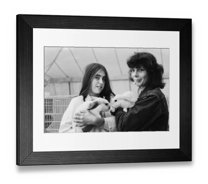 Framed Print : Reading show, in Reading Berkshire. (Picture) Girls at the show holding rabbits Framed Print : Reading show, in Reading Berkshire. (Picture) Girls at the show holding rabbits
