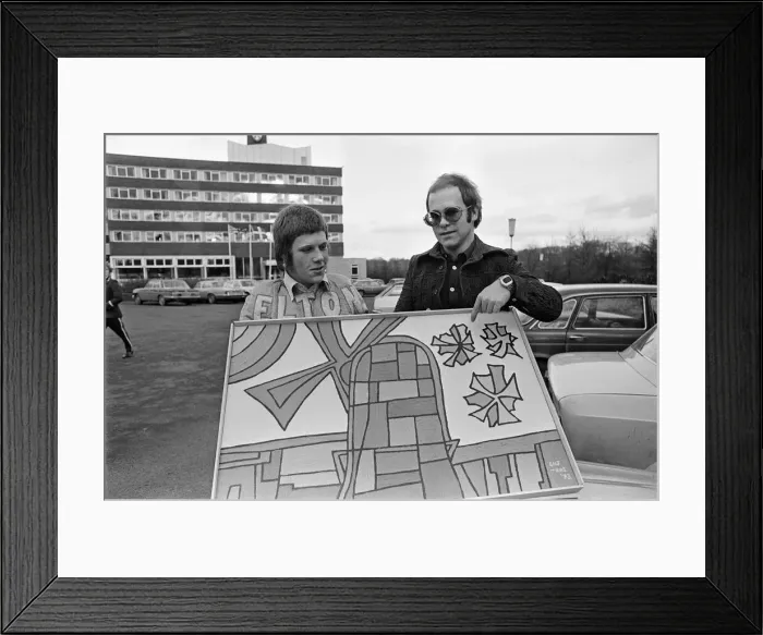 Framed Print : Elton John with a fan. 22nd December 1973