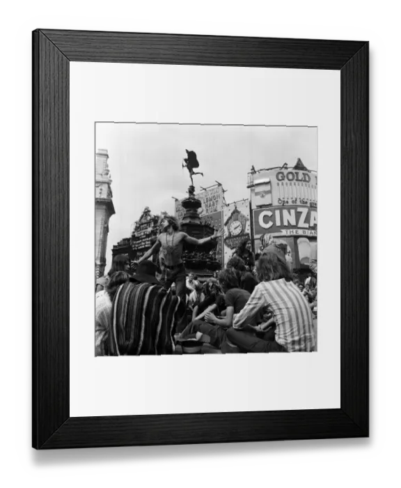 Framed Print : A group of hippies in Piccadilly Circus, London. 15th August 1969 Framed Print : A group of hippies in Piccadilly Circus, London. 15th August 1969