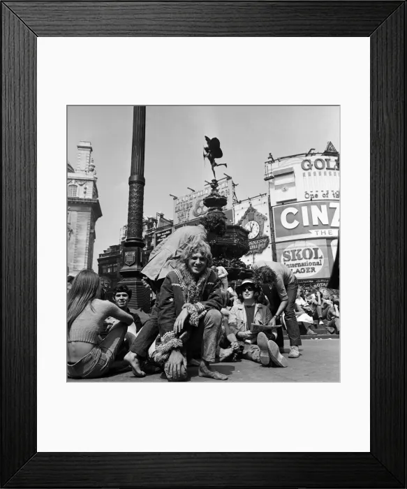 Framed Print : A group of hippies in Piccadilly Circus, London. 15th August 1969 Framed Print : A group of hippies in Piccadilly Circus, London. 15th August 1969
