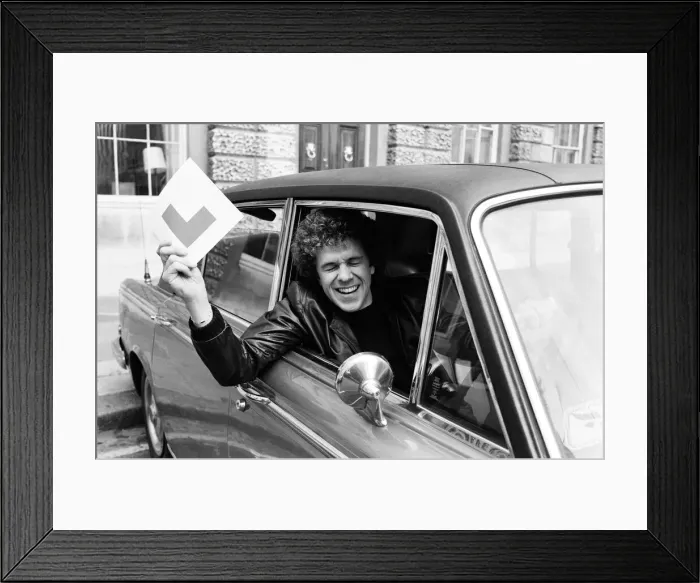 Framed Print : After years of being driven around by his wife 31-year-old Leo Sayer has passed his
