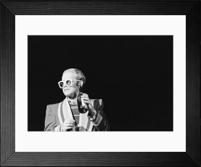 Framed Print : Pop star Elton John on stage at Earls Court, London. This is his first London concert Framed Print : Pop star Elton John on stage at Earls Court, London. This is his first London concert