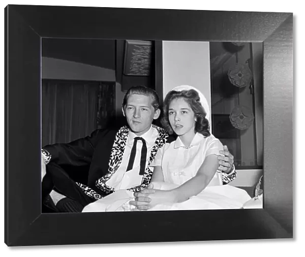 Jerry Lee Lewis and his 13-year-old wife Myra at the Westbury Hotel, London