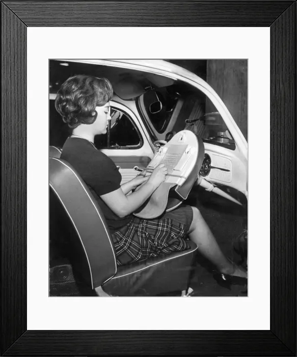 Framed Print : A dispatch case that unzips to fit over a car steering wheel converting it into a solid Framed Print : A dispatch case that unzips to fit over a car steering wheel converting it into a solid