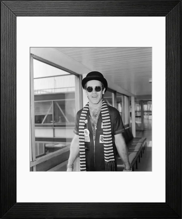 Framed Print : Elton John pictured on his arrival from a recording session in Los Angeles Framed Print : Elton John pictured on his arrival from a recording session in Los Angeles