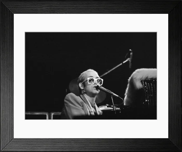 Framed Print : Pop star Elton John on stage at Earls Court, London. This is his first London concert Framed Print : Pop star Elton John on stage at Earls Court, London. This is his first London concert