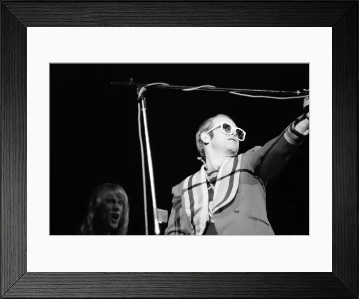 Framed Print : Pop star Elton John on stage at Earls Court, London. This is his first London concert Framed Print : Pop star Elton John on stage at Earls Court, London. This is his first London concert