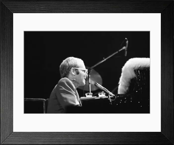 Framed Print : Pop star Elton John on stage at Earls Court, London. This is his first London concert Framed Print : Pop star Elton John on stage at Earls Court, London. This is his first London concert