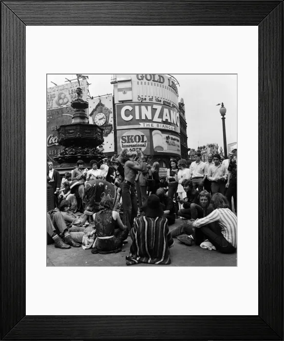 Framed Print : A group of hippies in Piccadilly Circus, London. 15th August 1969 Framed Print : A group of hippies in Piccadilly Circus, London. 15th August 1969