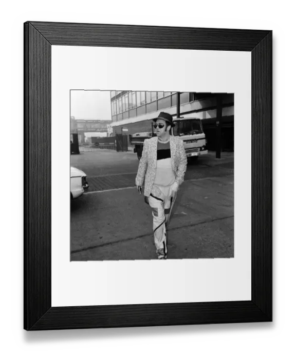 Framed Print : Elton John pictured arriving at Heathrow Airport from Los Angeles