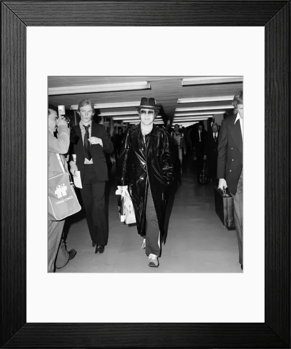 Framed Print : Elton John pictured arriving at Heathrow Airport from Paris