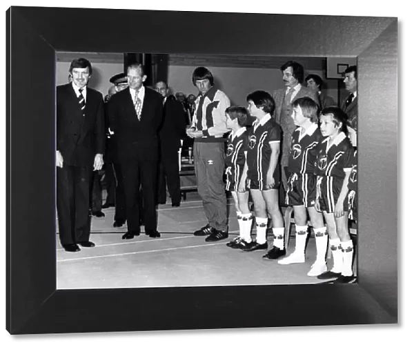 Prince Philip, Duke of Edinburgh, accompanied by Coventry City Chairman Jimmy Hill