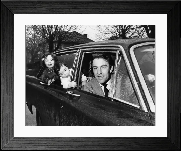 Framed Print : Jimmy Greaves very much alive takes his wife and two children out for a ride in his car