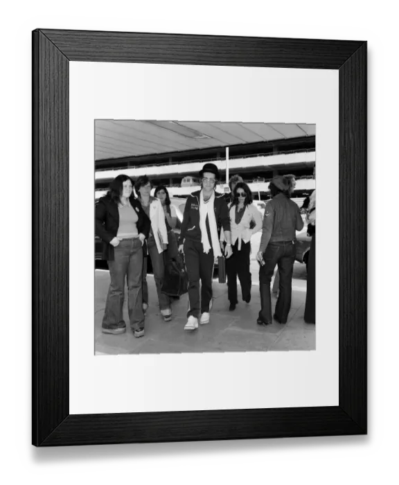 Framed Print : Elton John leaving Heathrow airport for Los Angeles. He will be away for about a month Framed Print : Elton John leaving Heathrow airport for Los Angeles. He will be away for about a month
