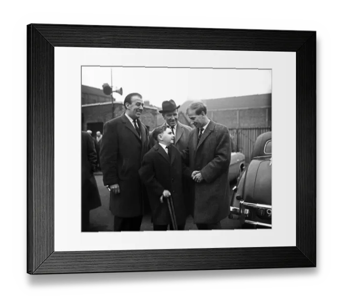 Framed Print : Bobby Charlton, of Manchester United, meets young fan Leslie Ripley of Barking Framed Print : Bobby Charlton, of Manchester United, meets young fan Leslie Ripley of Barking