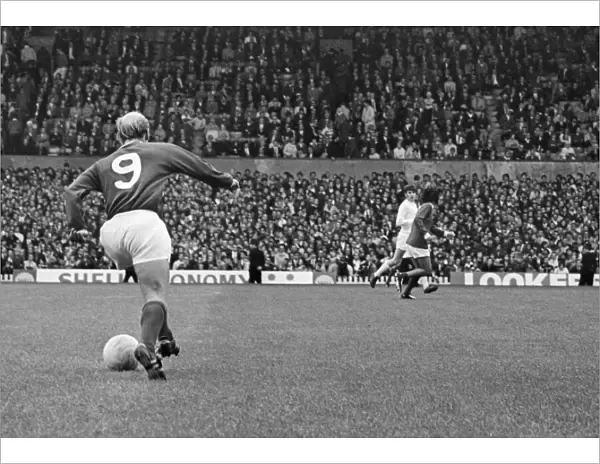 Bobby Charlton, in the number 9 shirt for Manchester United, at Old Trafford