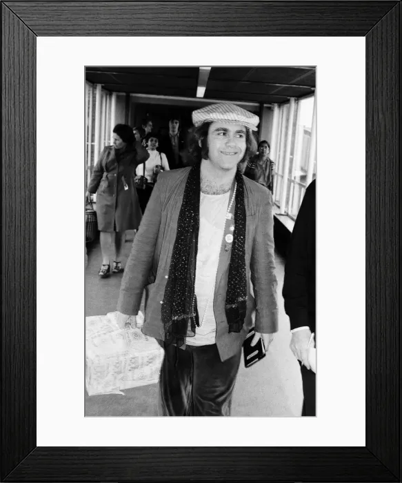 Framed Print : Elton John, pictured at Heathrow Airport, after his eight trail-blazing concerts in Framed Print : Elton John, pictured at Heathrow Airport, after his eight trail-blazing concerts in
