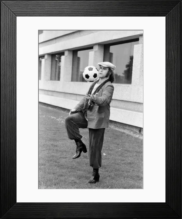Framed Print : Elton John, arrives back in London after his successful tour of Russia